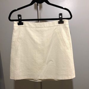 The Limited • Cream mini skirt